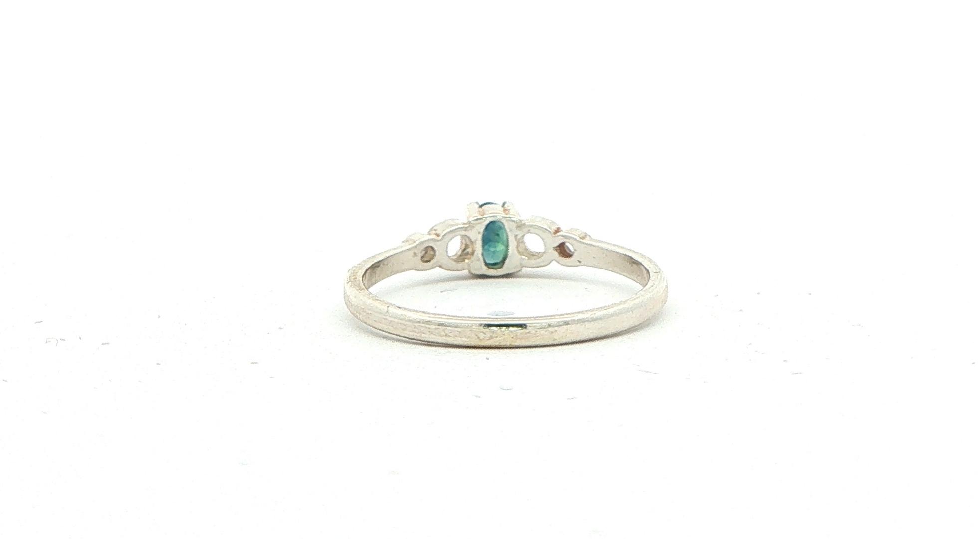 Oval Montana Sapphire Solitaire Ring with Openwork Circles Details in Sterling Silver (0.25cts) back