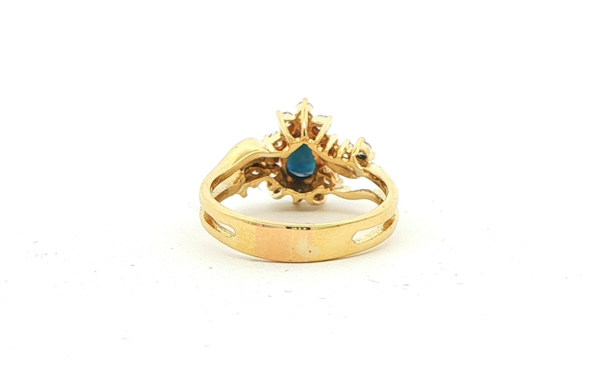 Estate Piece: Pear Sapphire and Diamond Halo Bypass Ring Yellow Gold (1.25cts TWT) back