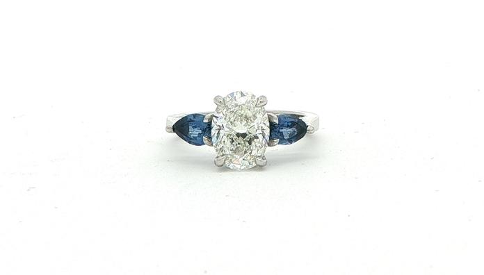 content/products/Oval Diamond and Pear Montana Yogo Sapphire Three-Stone Ring in Platinum (3.43cts TWT)