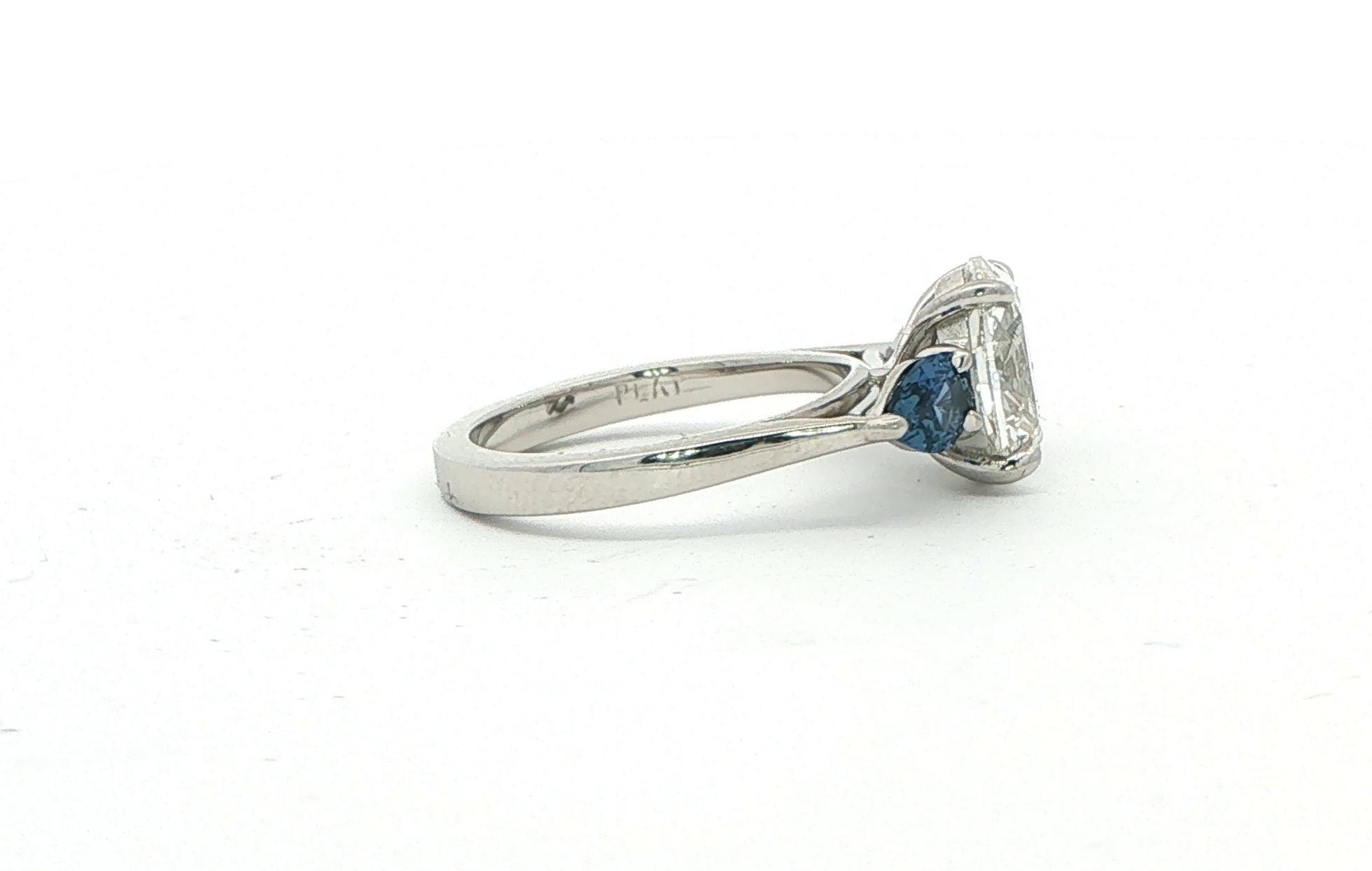 Oval Diamond and Pear Montana Yogo Sapphire Three-Stone Ring in Platinum (3.43cts TWT) side