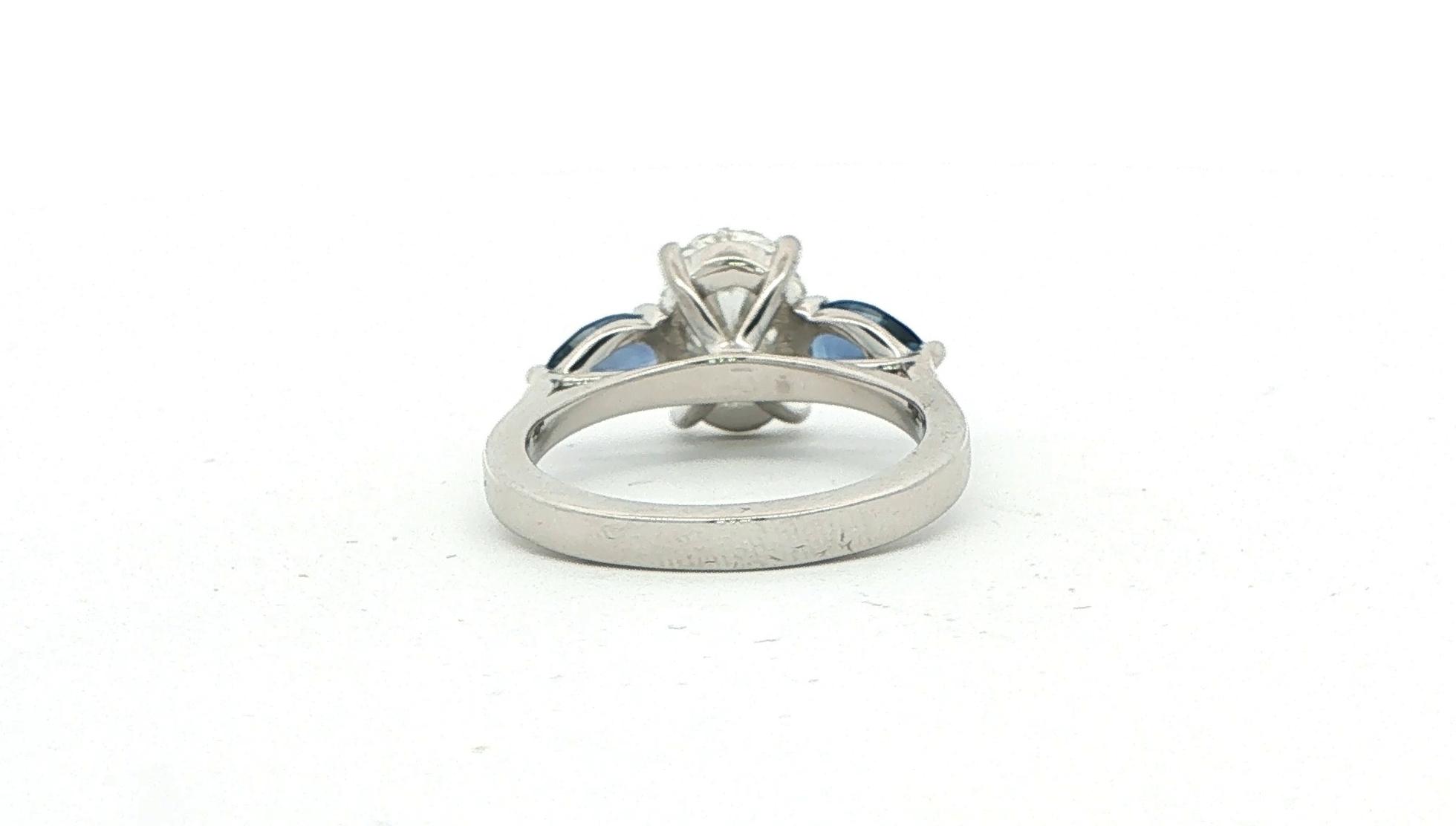 Oval Diamond and Pear Montana Yogo Sapphire Three-Stone Ring in Platinum (3.43cts TWT) back