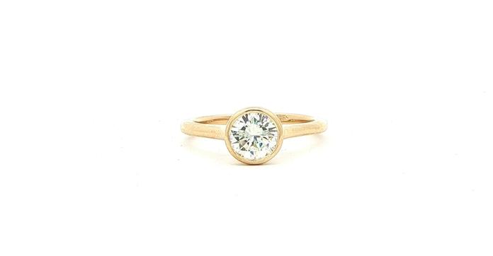 content/products/Bezel-set Diamond Solitaire Ring with Cathedral Shank in Yellow Gold (0.99cts)