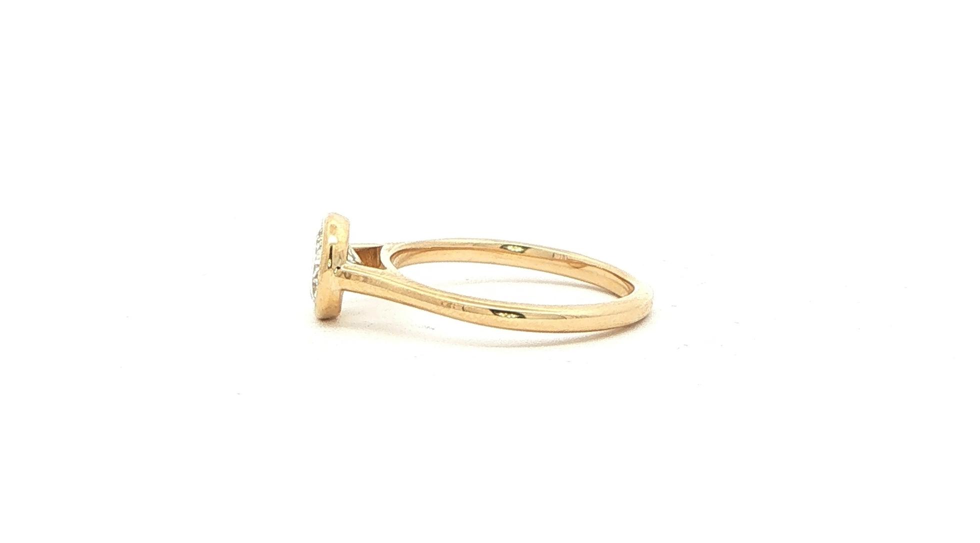 Bezel-set Diamond Solitaire Ring with Cathedral Shank in Yellow Gold (0.99cts) side