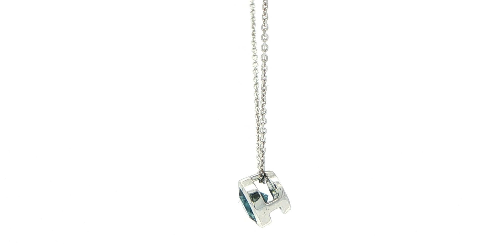 Solitaire Montana Sapphire Bezel Pendant Necklace in White Gold (0.65ct) side