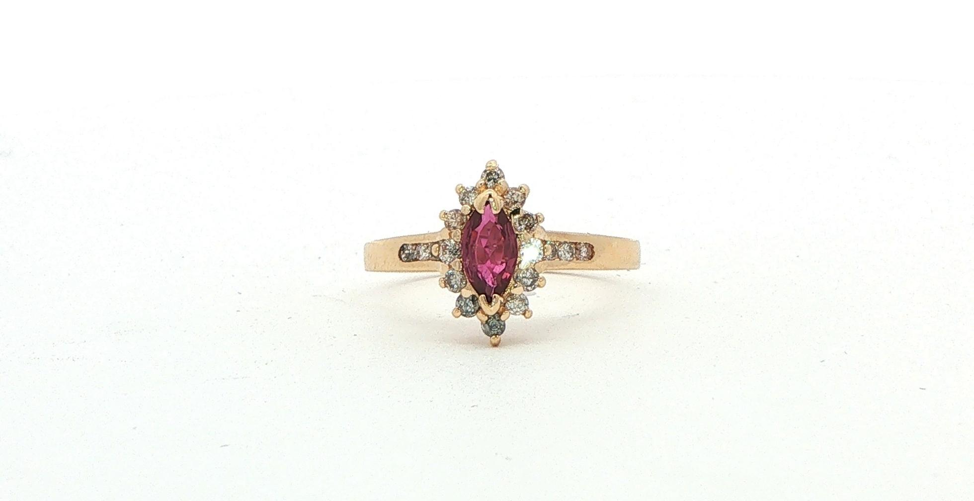 Estate Piece: Marquise Halo Ruby and Diamond Ring in Yellow Gold (0.45cts TWT)