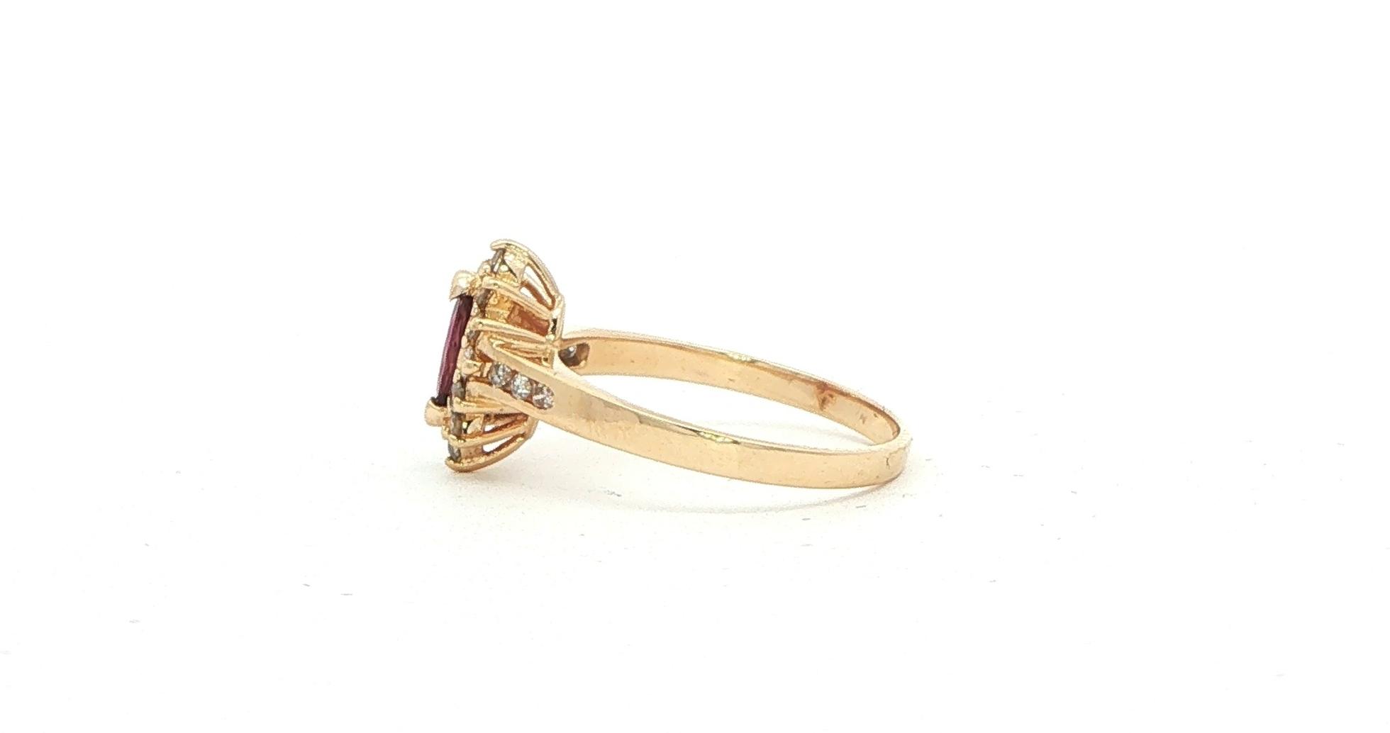 Estate Piece: Marquise Halo Ruby and Diamond Ring in Yellow Gold (0.45cts TWT) side