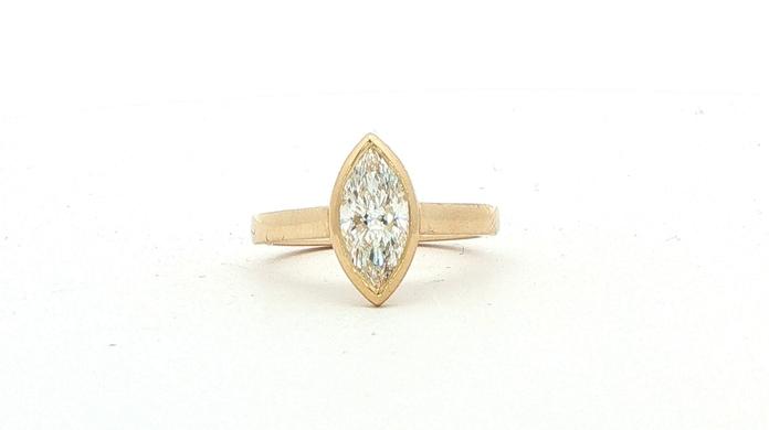 content/products/Marquise Cut Lab Grown Diamond Bezel Set Solitaire Ring in Yellow Gold (1.08ct)