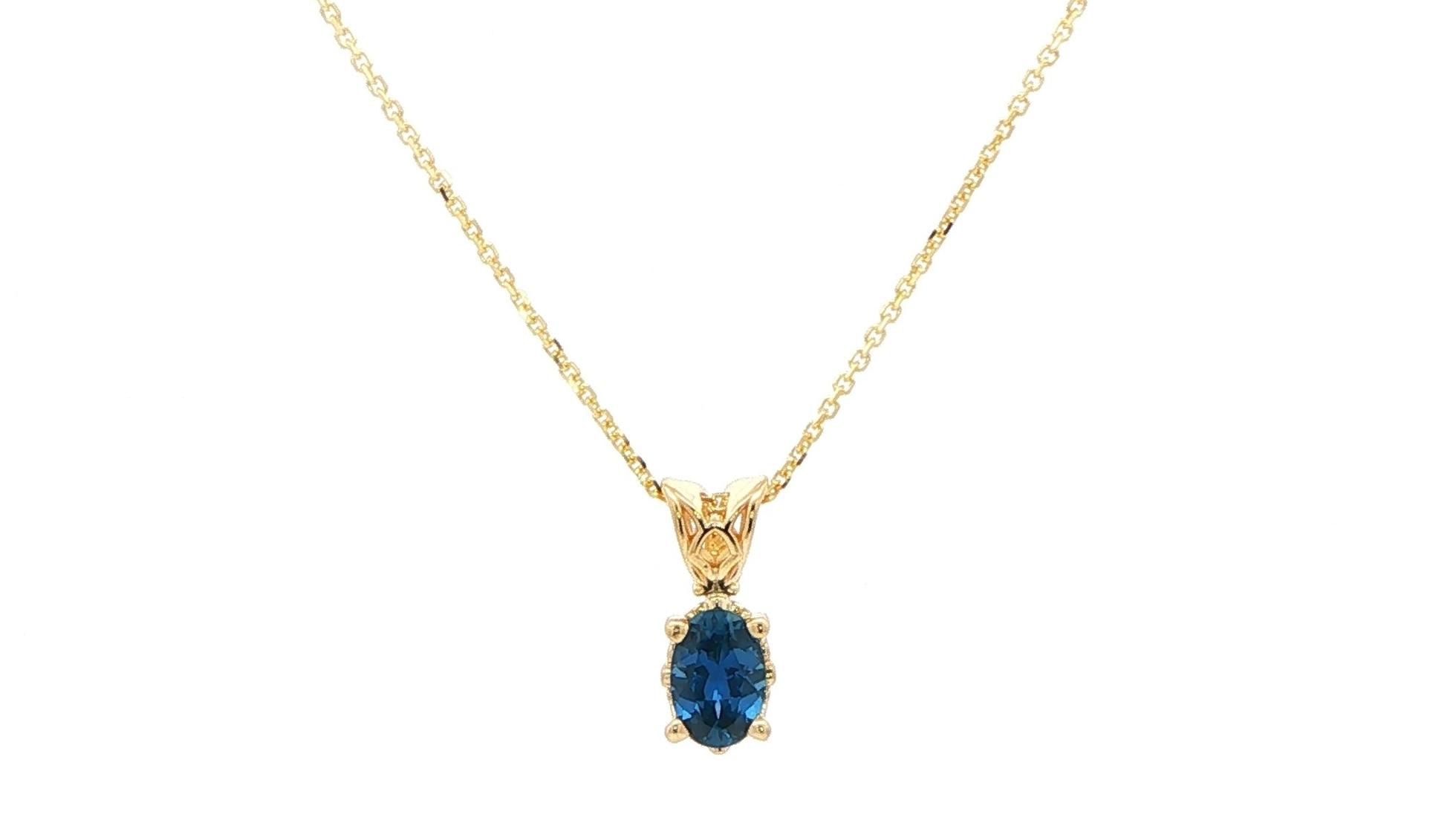 Oval Montana Yogo Sapphire Pendant Necklace with Scroll Detail in Yellow Gold (0.53cts)