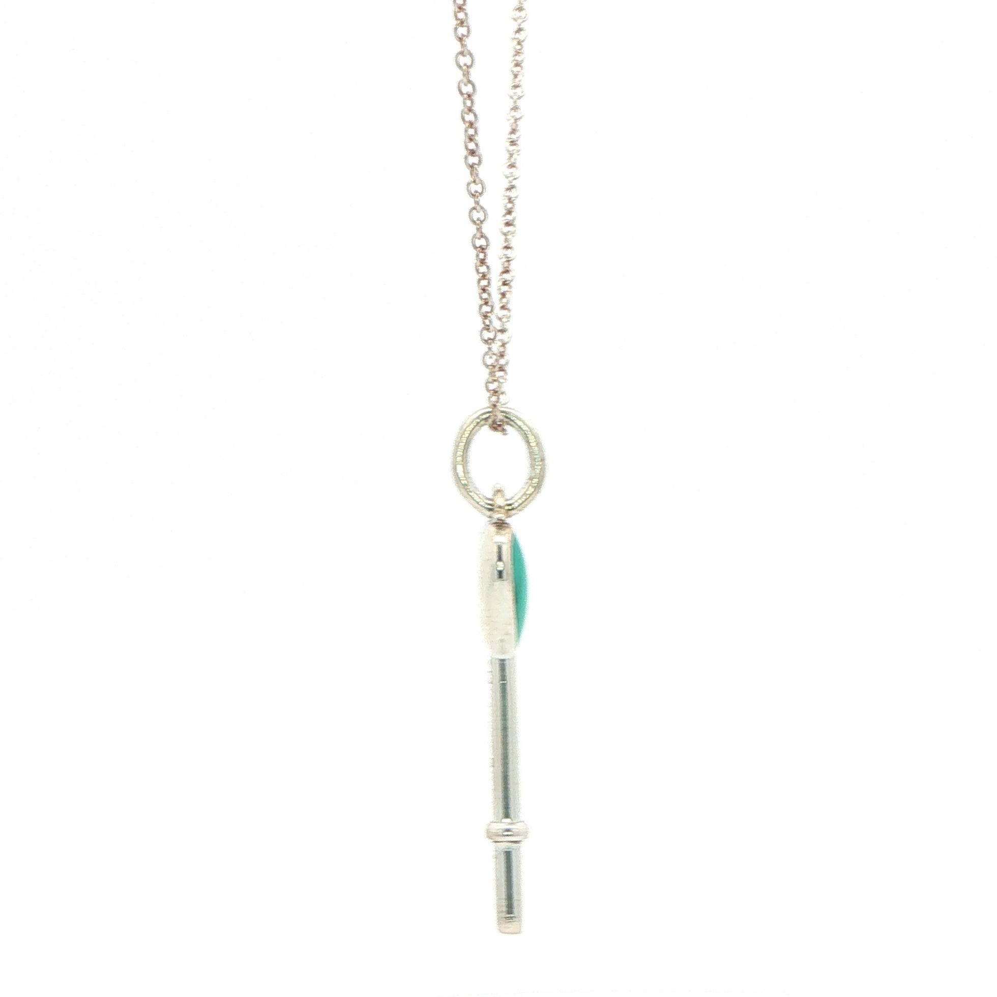 Estate Piece: Tiffany and Co. Enamel Heart Key Charm Necklace in Sterling Silver side