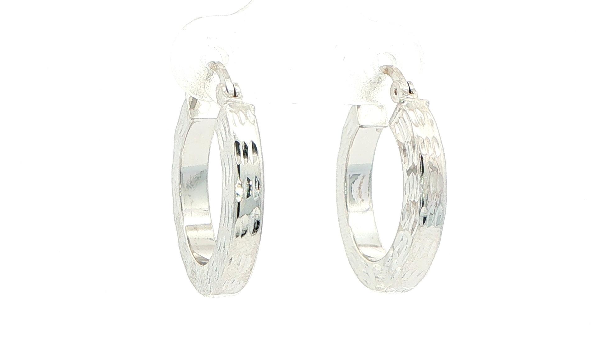 Estate Piece: Diamond-Cut Hoop Earrings in White Gold angled