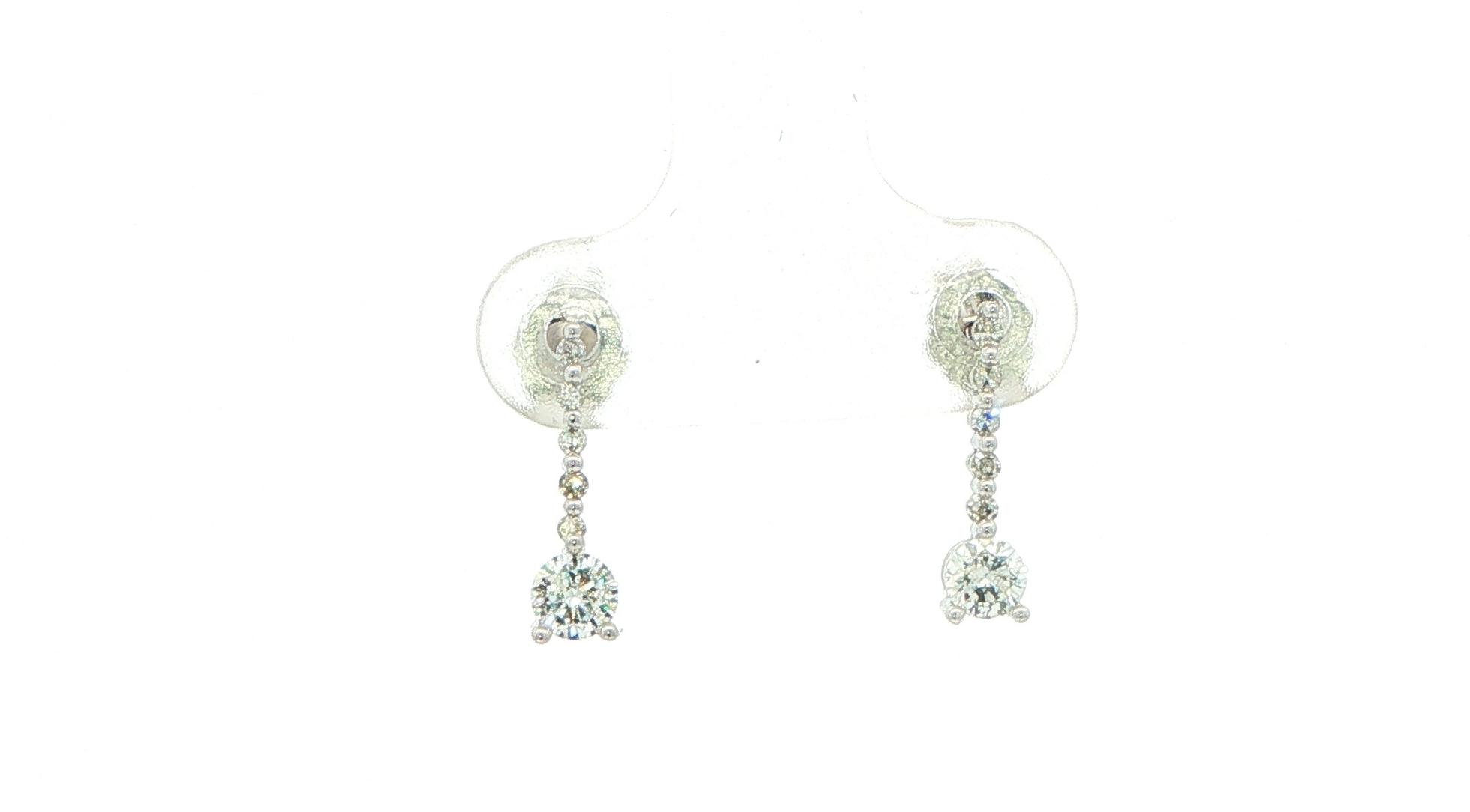 Estate Piece: 6-Stone Diamond Linear Drop Earrings in White Gold (0.35cts TWT)