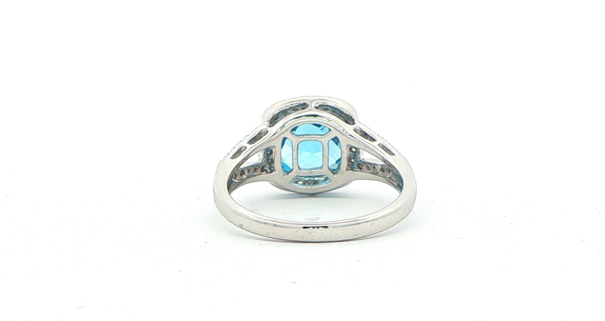 Estate Piece: Cushion Blue Topaz Split Shank Halo Ring in White Gold back