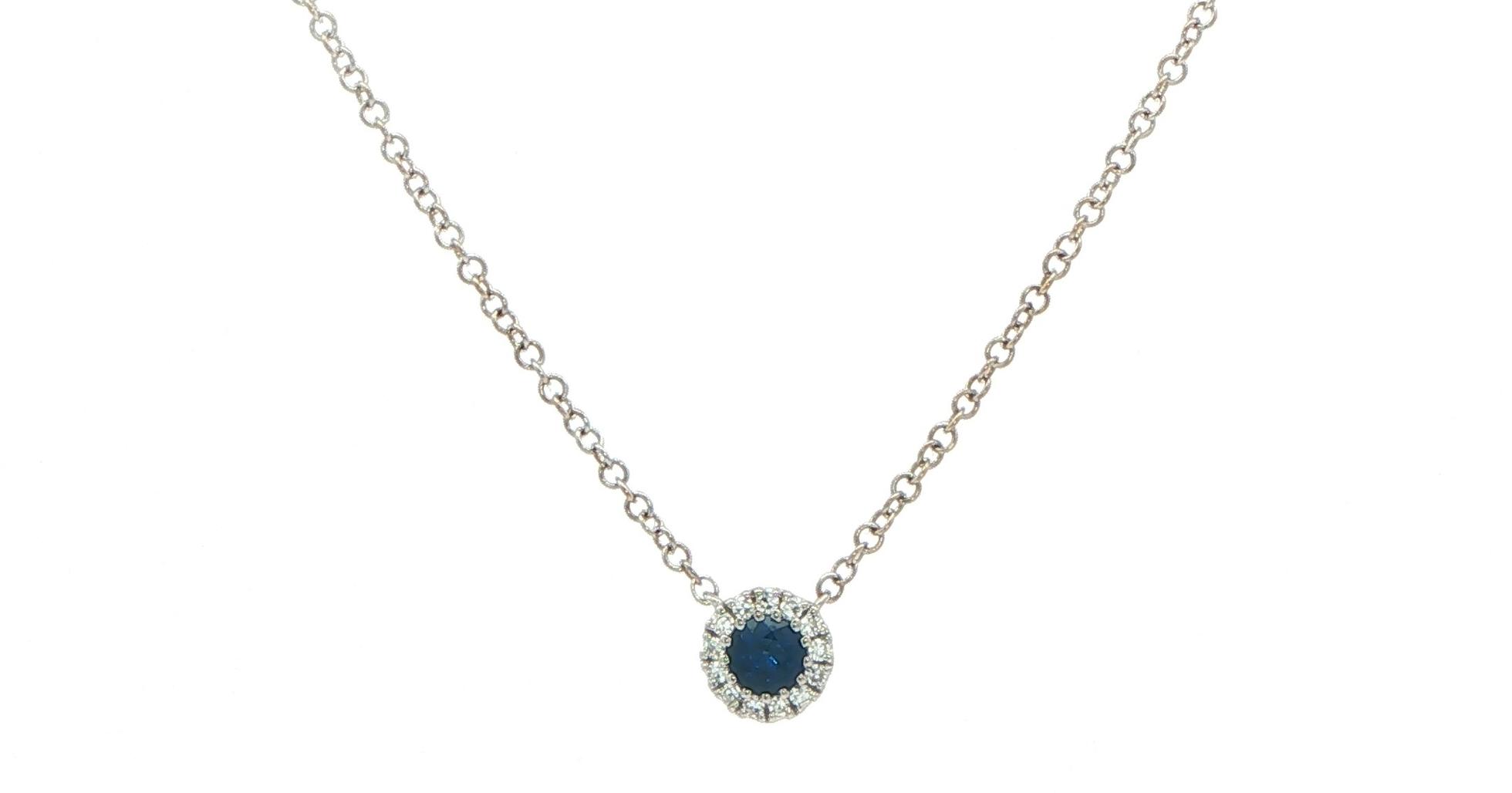 Estate Piece: Royal Blue Sapphire Halo Pendant Necklace in White Gold (0.25cts TWT)