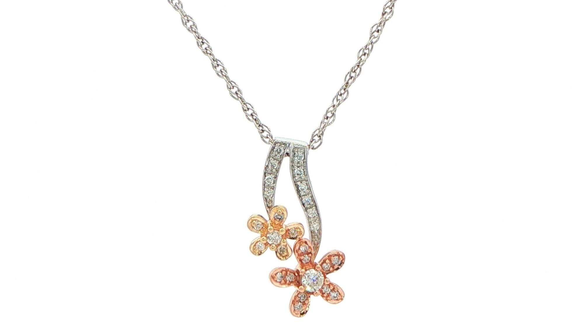 Estate Piece: Spinning Double Floral Diamond Charm Necklace in Tri-Tone White, Yellow, and Rose Gold (0.25cts TWT)