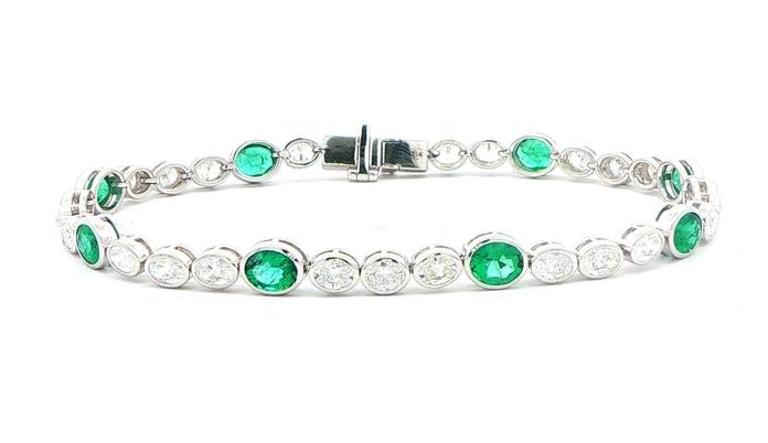 content/products/Bezel-Set Oval Emerald and Diamond Tennis Bracelet in White Gold (5.93cts TWT)