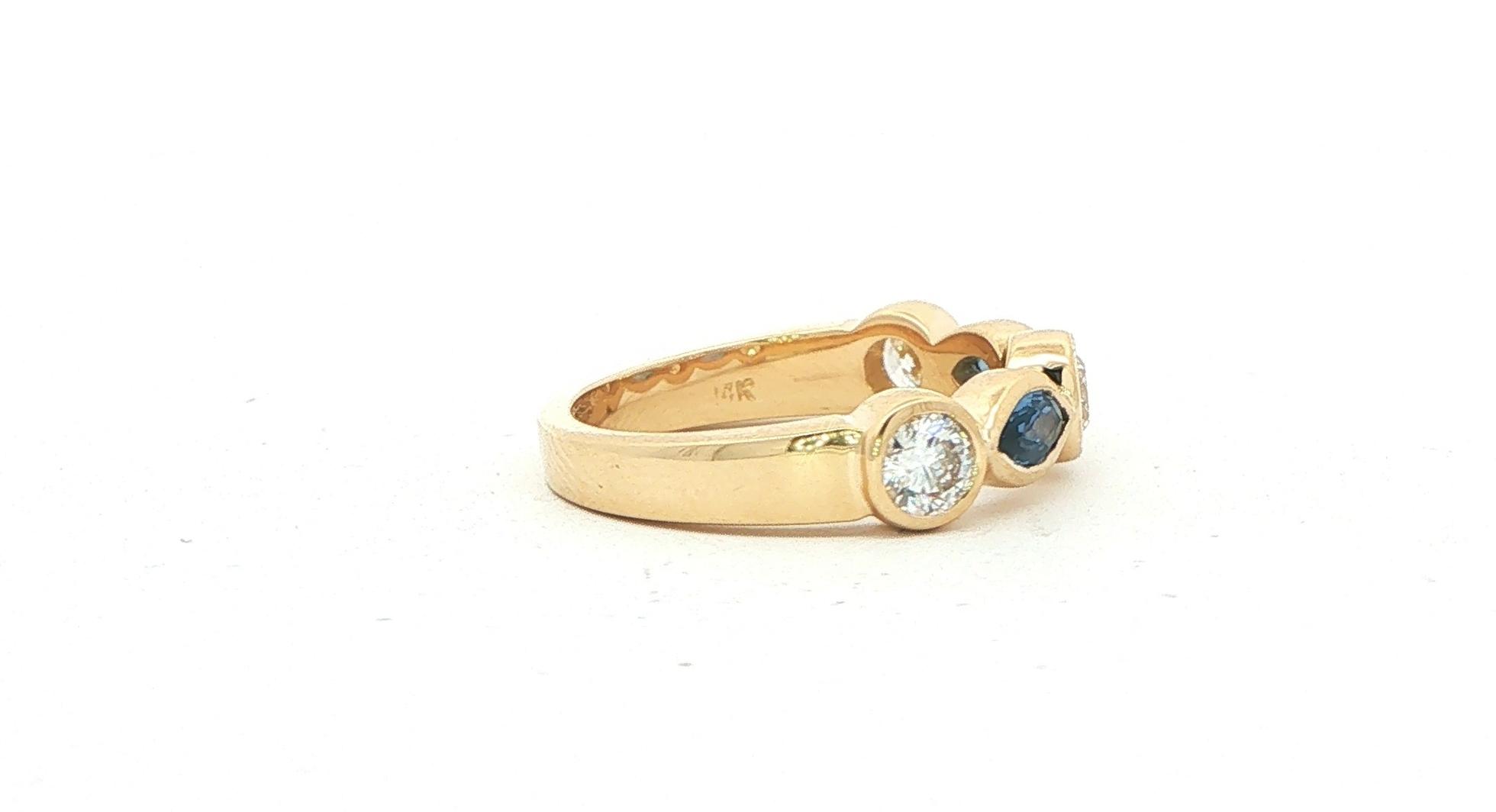 Bezel-Set Marquise Montana Yogo Sapphire and Round Diamond Ring in Yellow Gold (1.11cts TWT) side