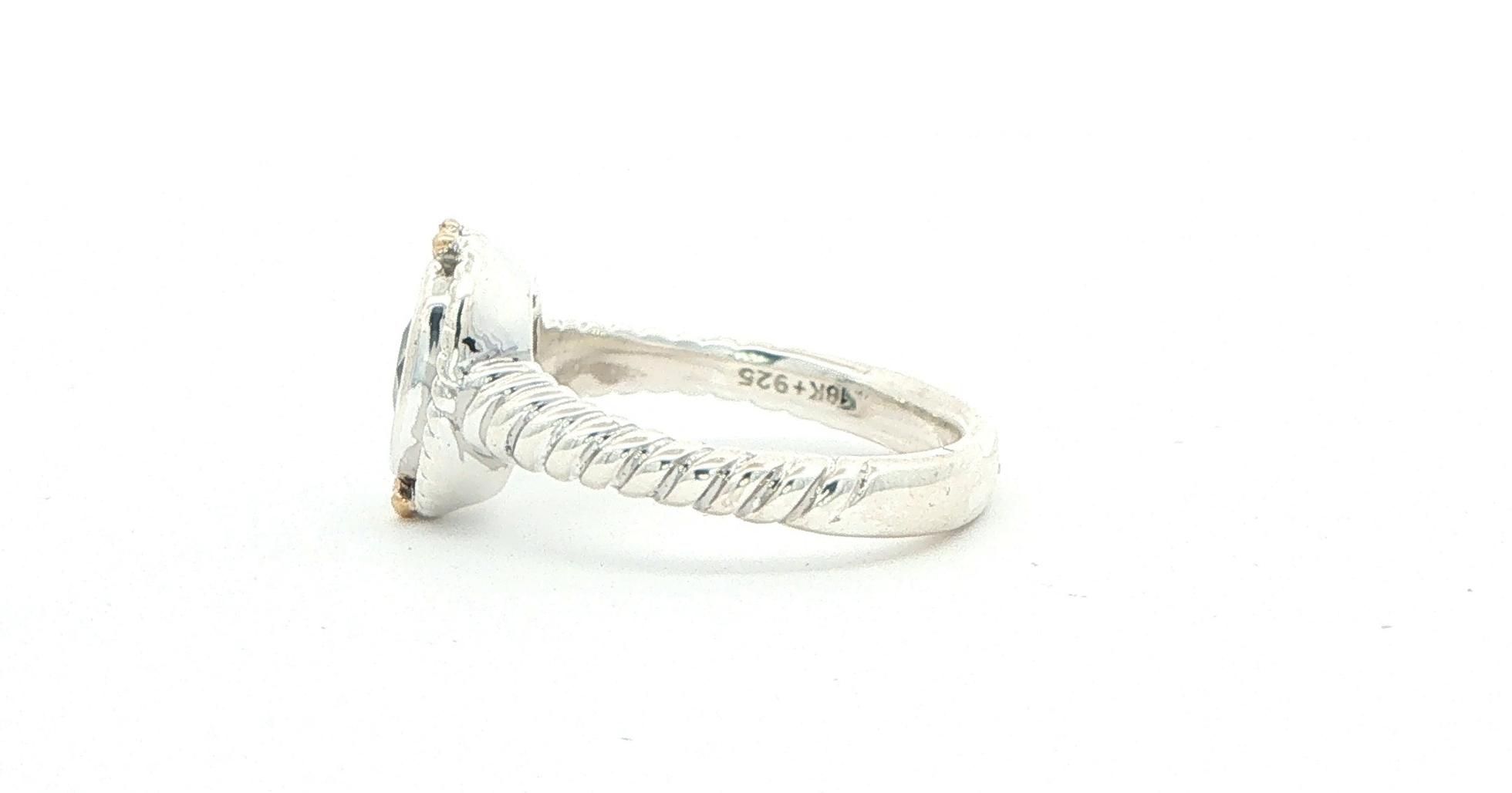 Estate Piece: Oval Aquamarine Cable Band Solitaire Ring in Sterling Silver with Yellow Gold Accent  side