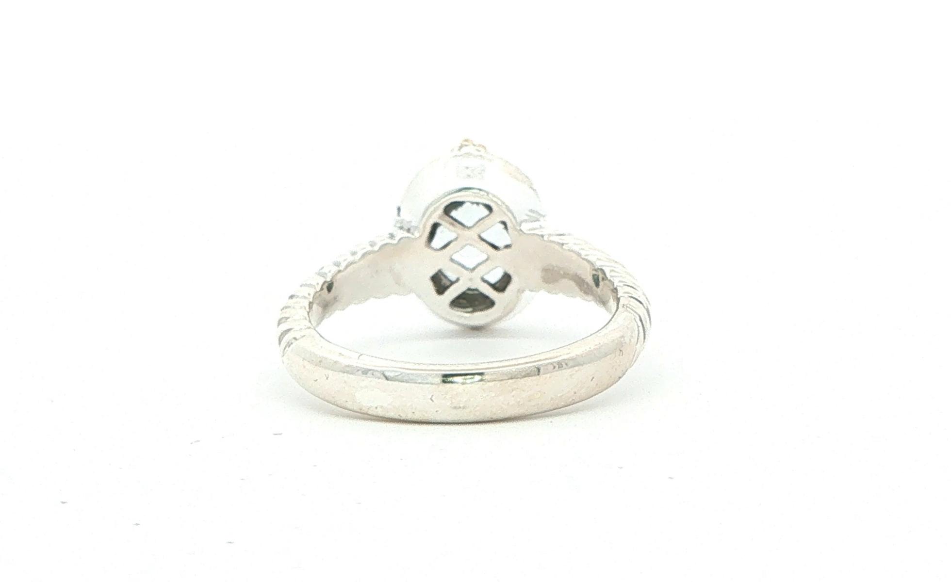 Estate Piece: Oval Aquamarine Cable Band Solitaire Ring in Sterling Silver with Yellow Gold Accent  back