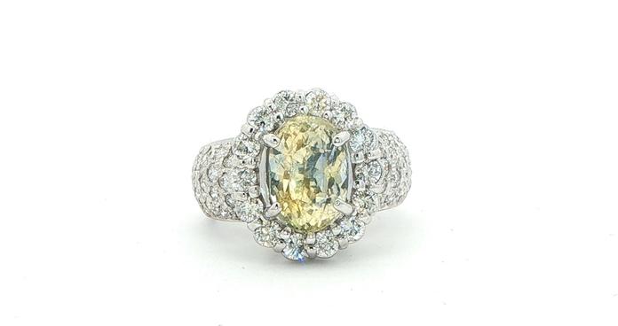 content/products/Estate Piece: Yellow Sapphire and Diamond Halo Cocktail Ring in White Gold (6.53cts TWT)