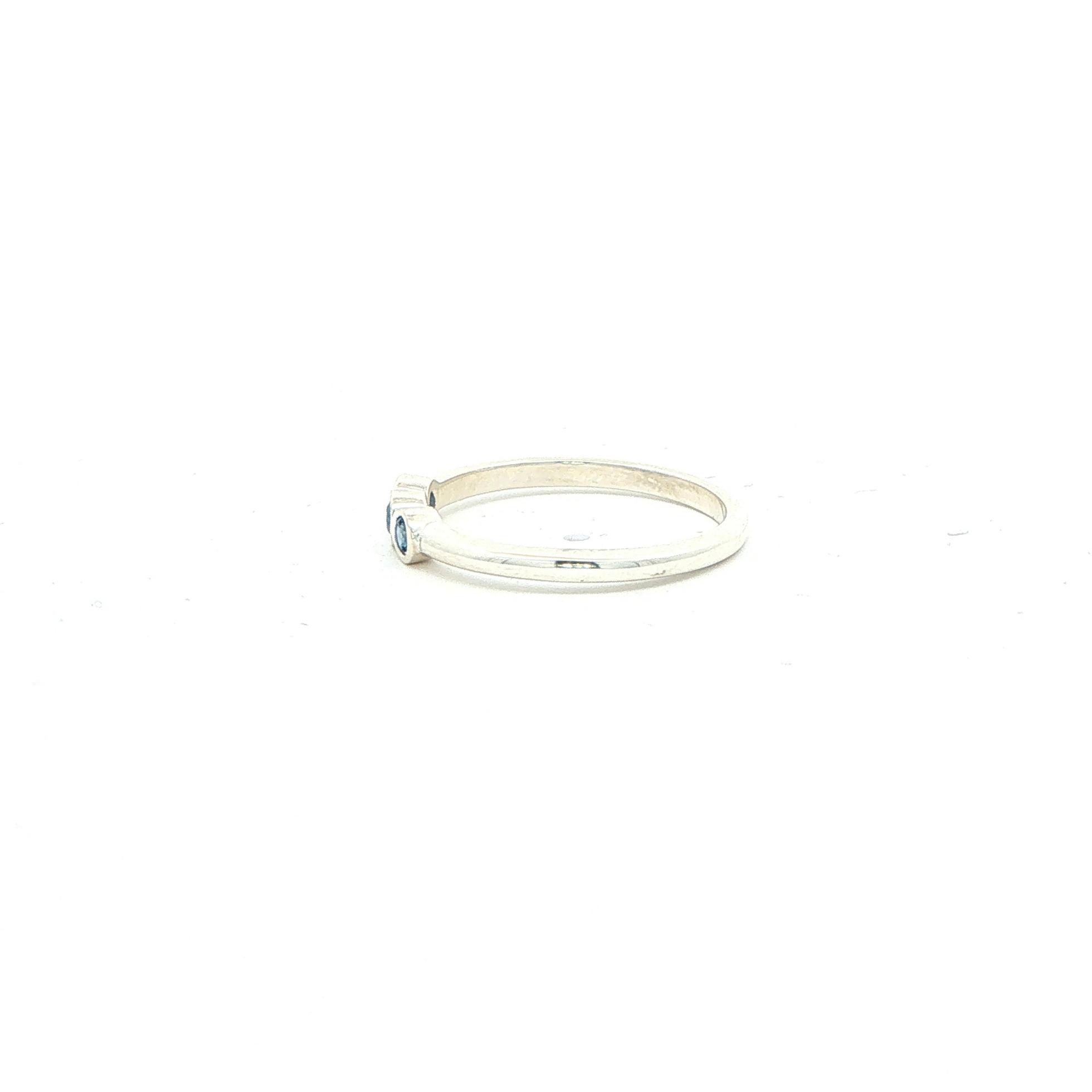 Three-Stone Montana Yogo Sapphire Bezel-Set Ring in Sterling Silver  (0.15cts TWT) side