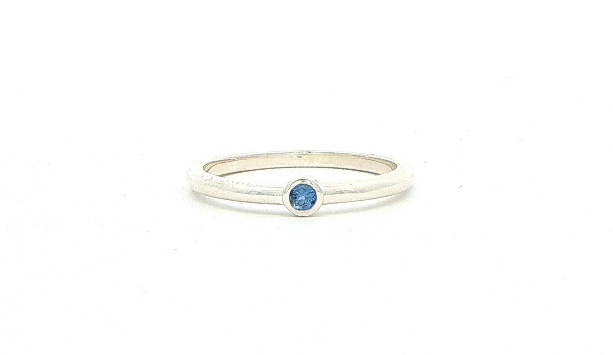 Bezel-Set Montana Yogo Sapphire Solitaire Ring in Sterling Silver (0.05ct)
