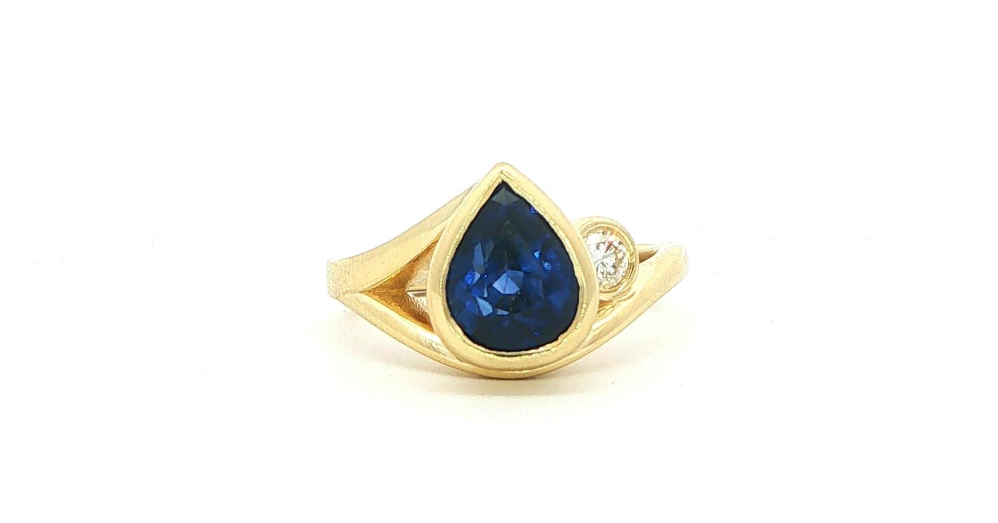 Bezel-set Pear-Shaped Royal Blue Sapphire and Diamond Ring Yellow Gold (3.68cts TWT)