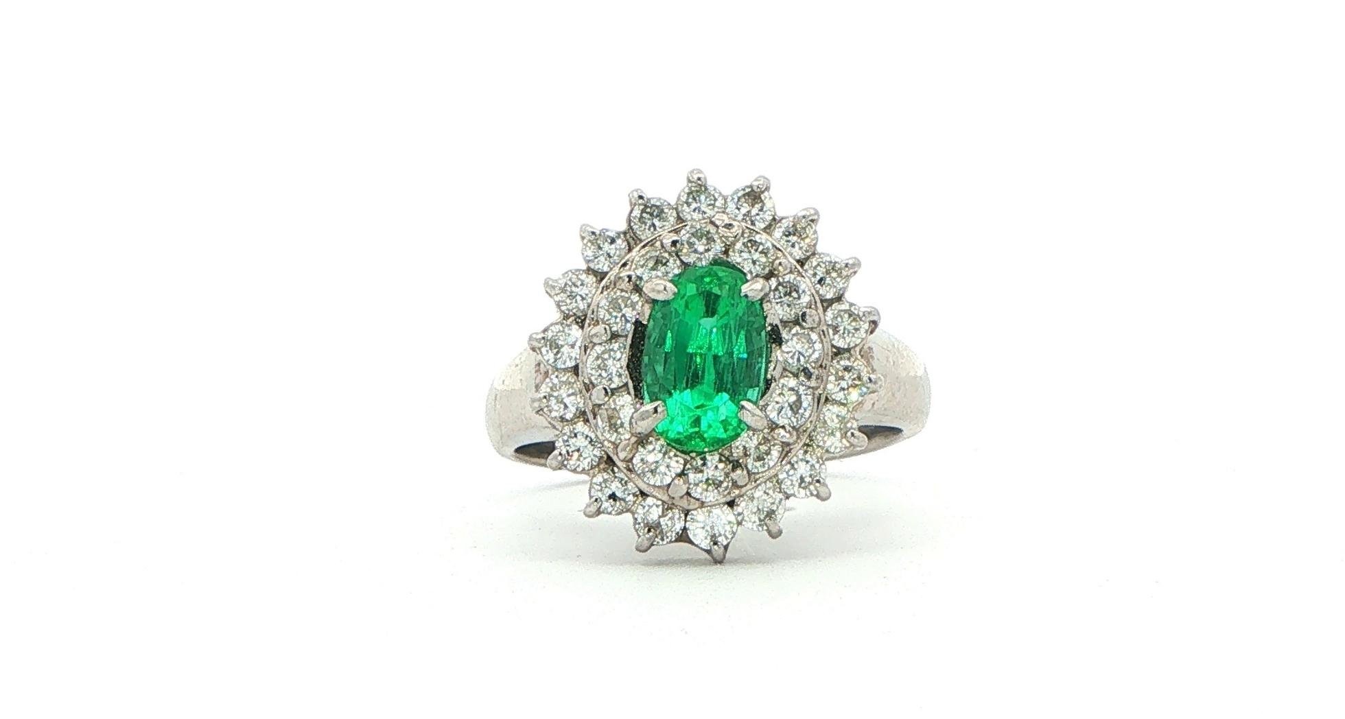 Estate Piece: Oval Emerald Double Diamond Halo Cocktail Ring in Platinum (2.00cts TWT)