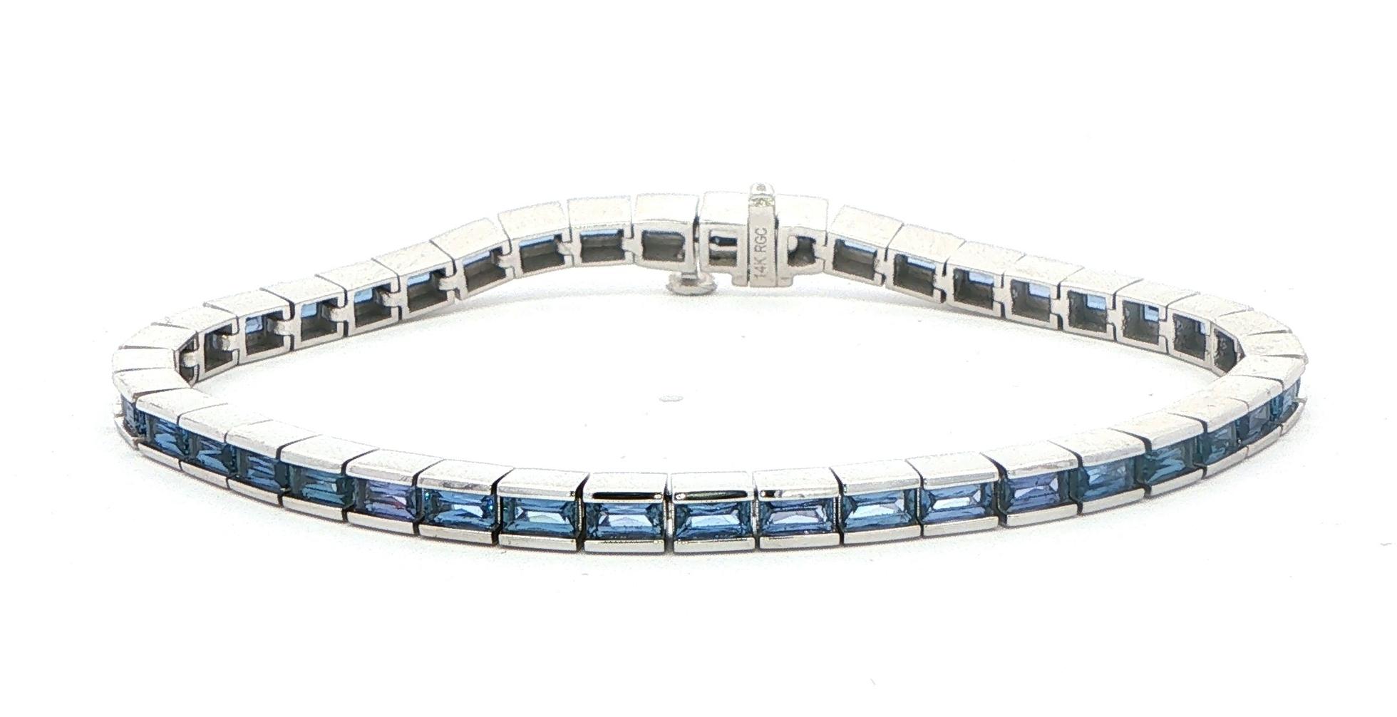 Channel-set Baguette Montana Yogo Sapphire Tennis Bracelet in White Gold (5.62cts TWT)