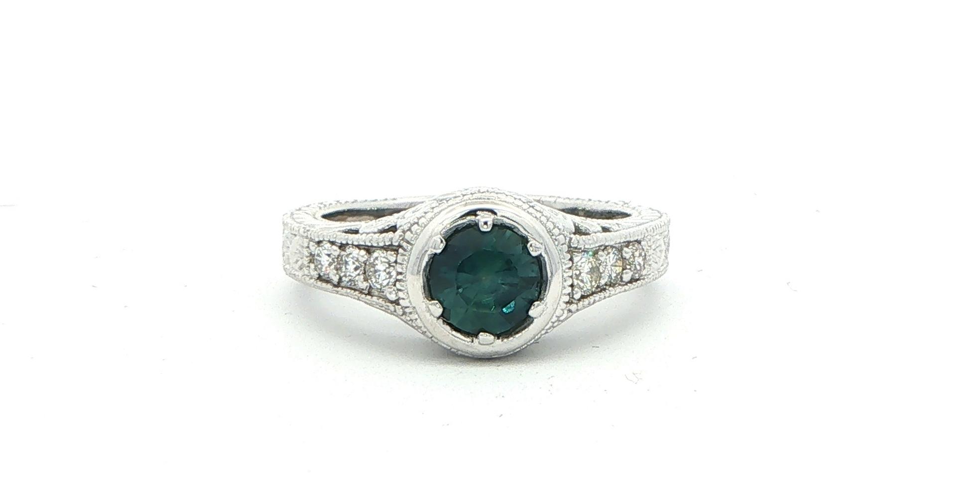 Estate Piece: Deep Blue Montana Sapphire and Diamond Ring with Hand Engraved Details in White Gold (1.20cts TWT)