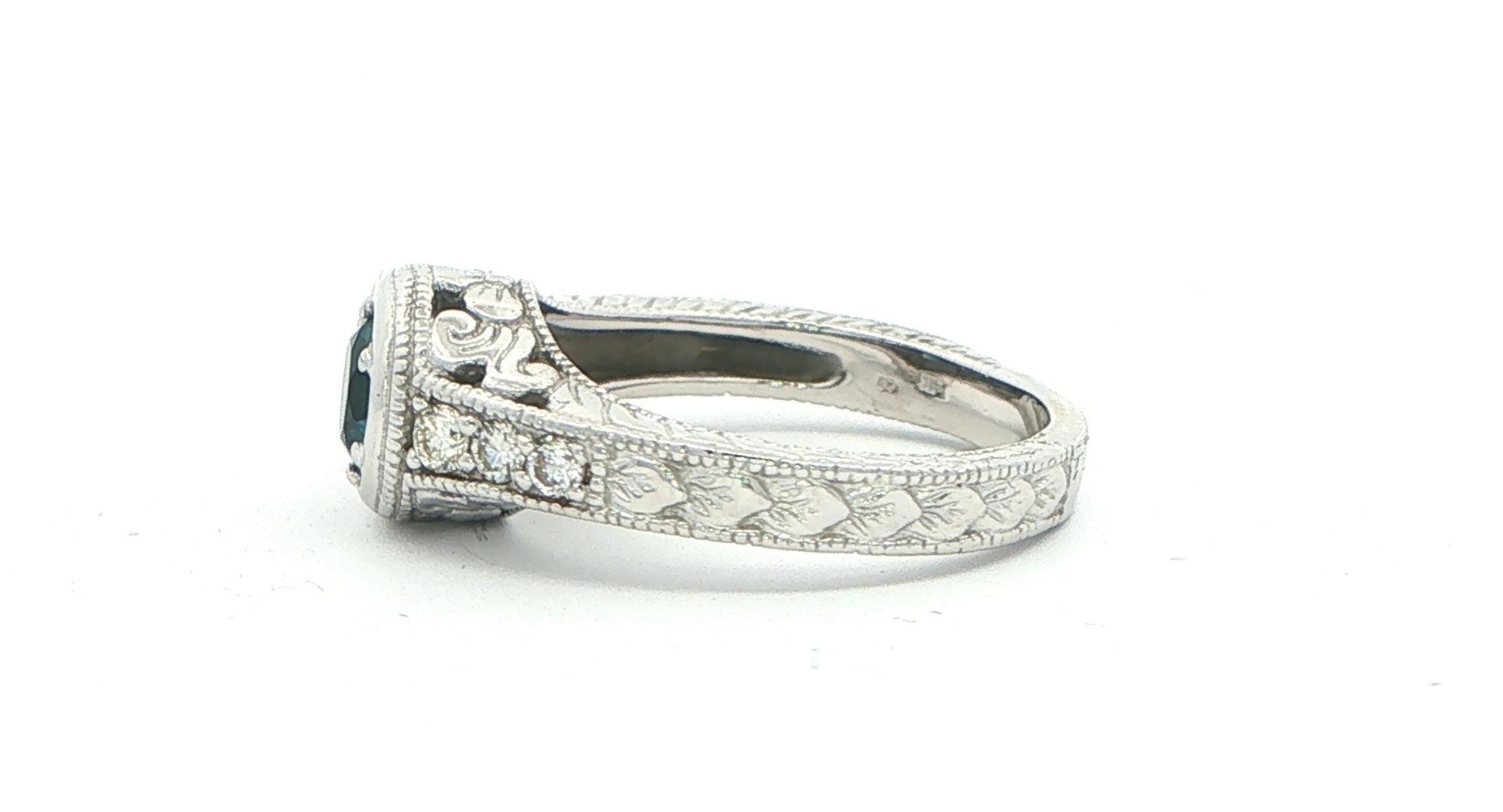 Estate Piece: Deep Blue Montana Sapphire and Diamond Ring with Hand Engraved Details in White Gold (1.20cts TWT) side