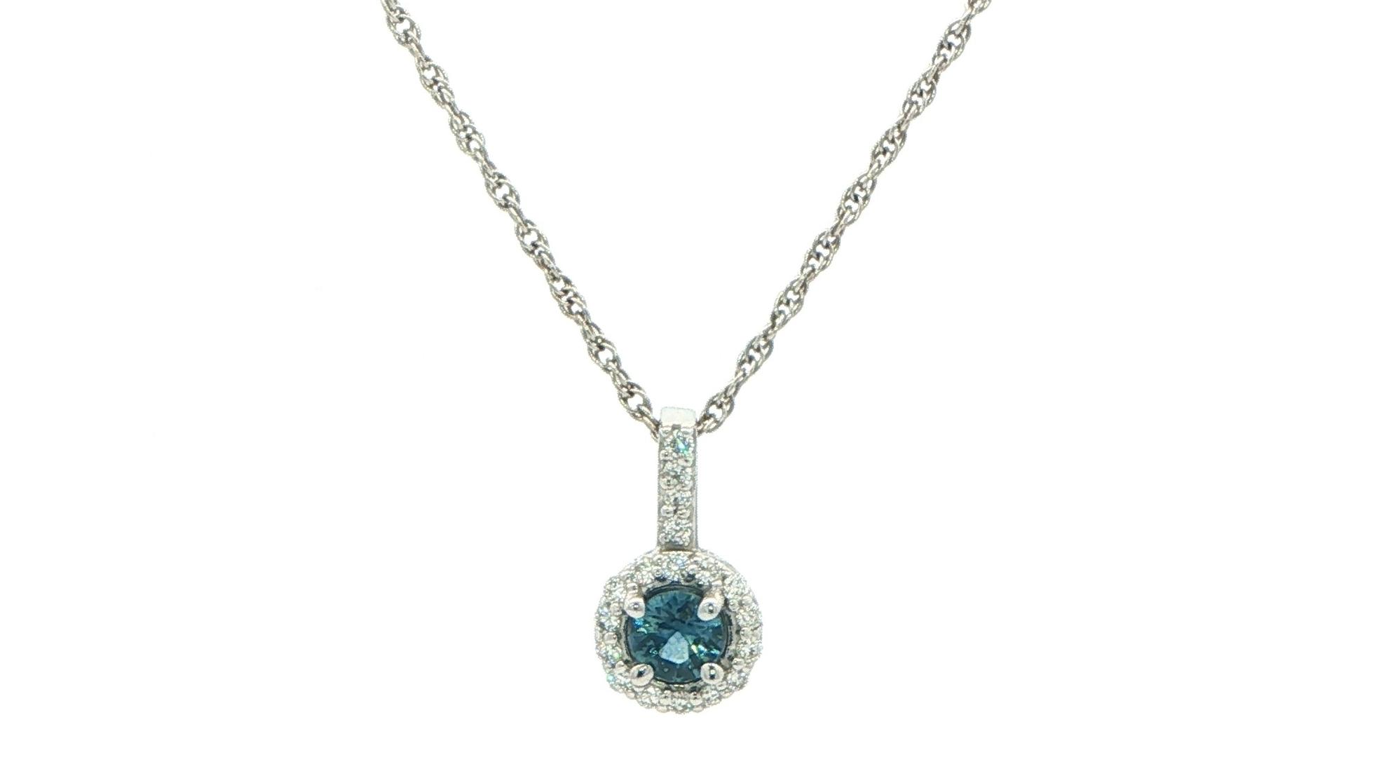 Estate Piece: Deep Blue Montana Sapphire Halo Pendant Necklace in White Gold (0.45cts TWT)