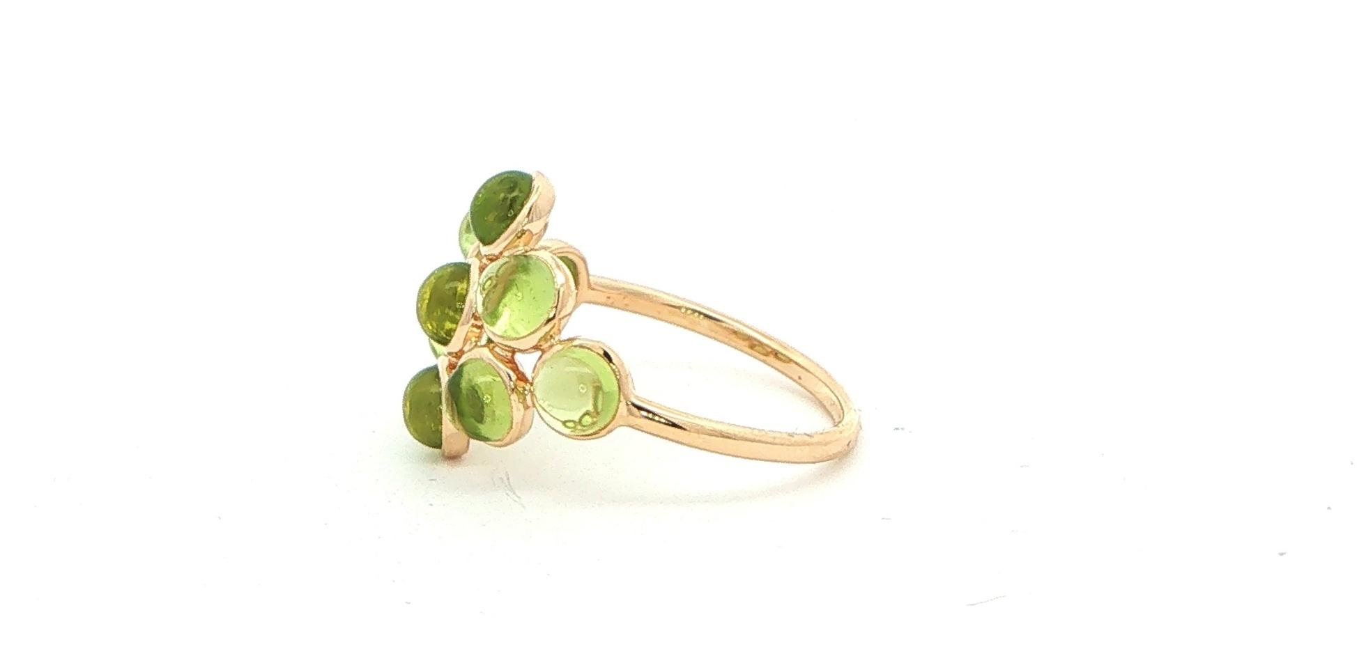 Estate Piece: Cabochon Peridot Cluster Cocktail Ring in Yellow Gold side