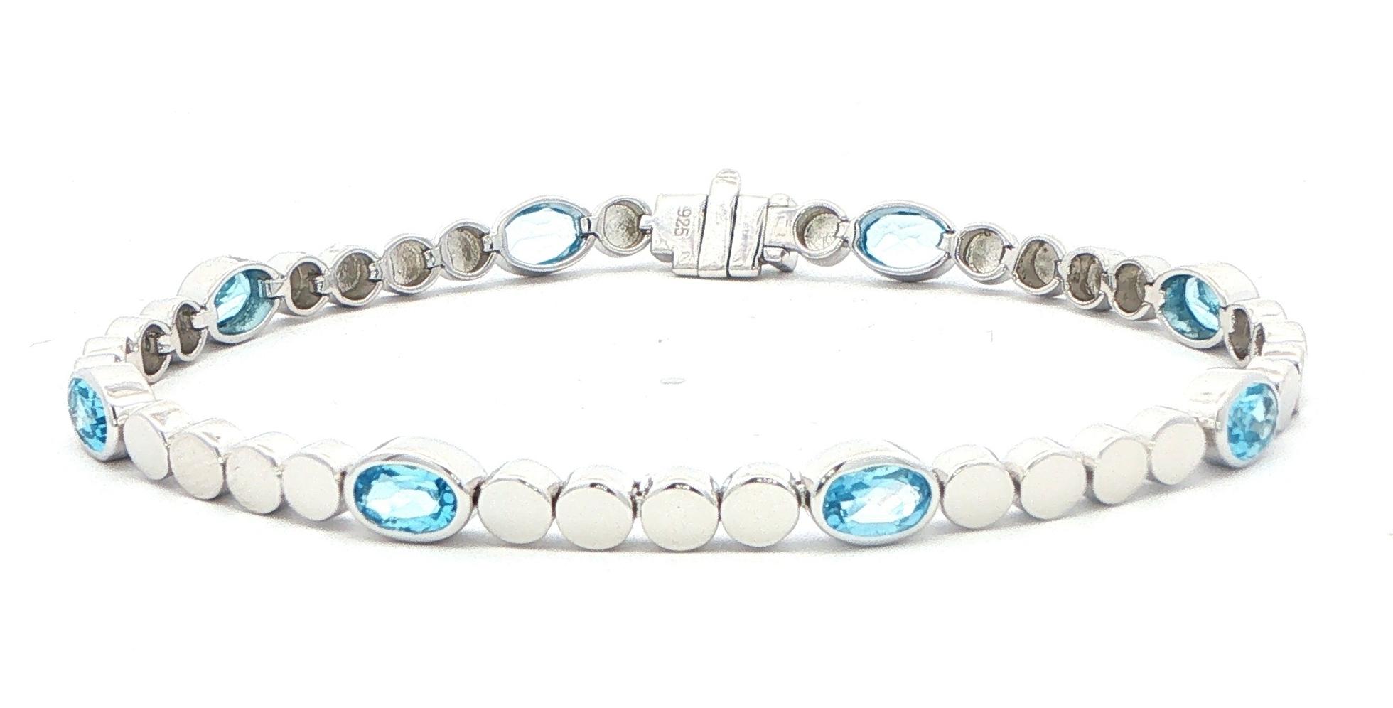 Oval Blue Topaz Station Line Bracelet in Sterling Silver (4.60cts TWT)