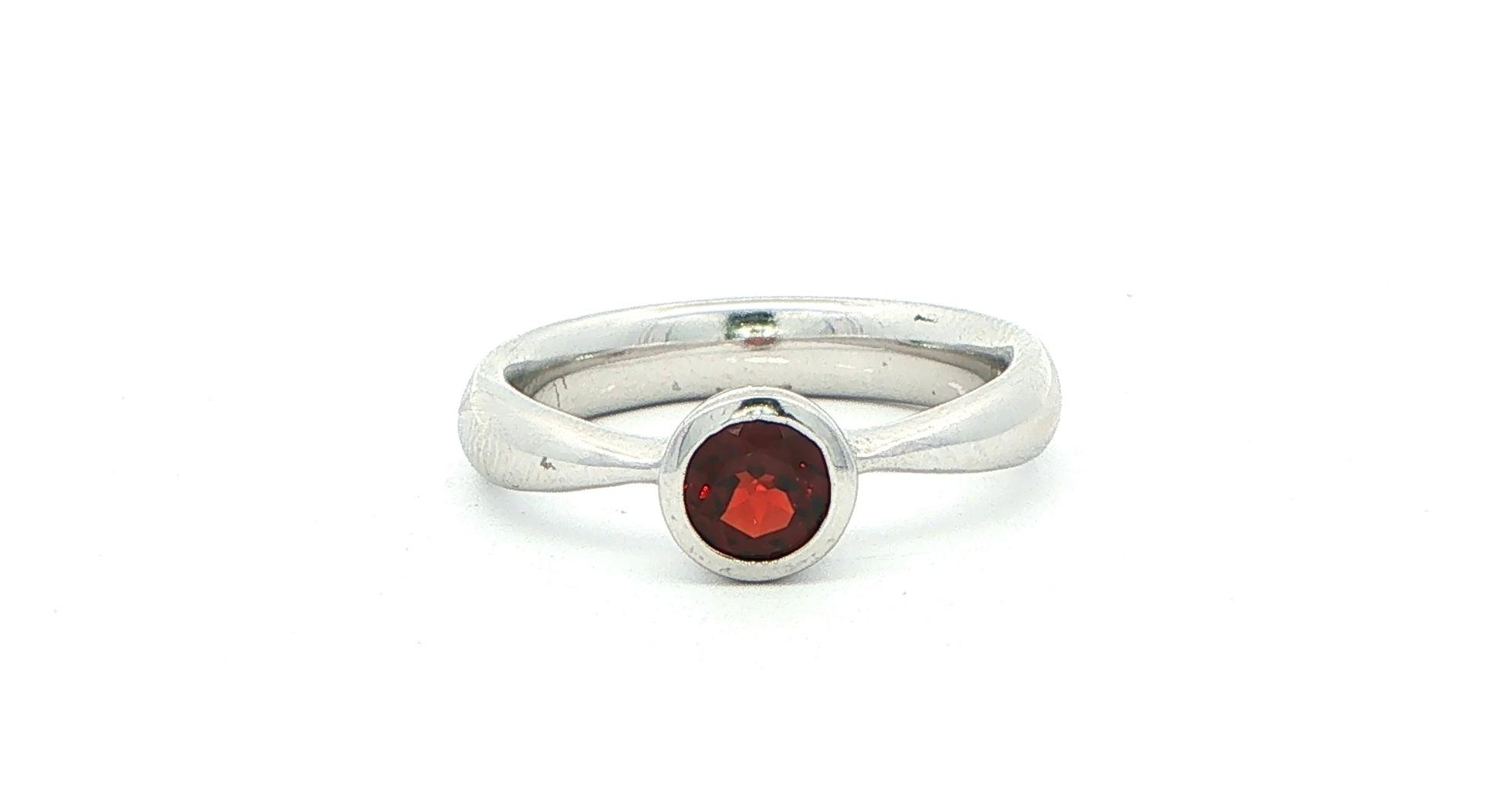 Bezel-Set Garnet Solitaire Ring in Sterling Silver (0.45cts)