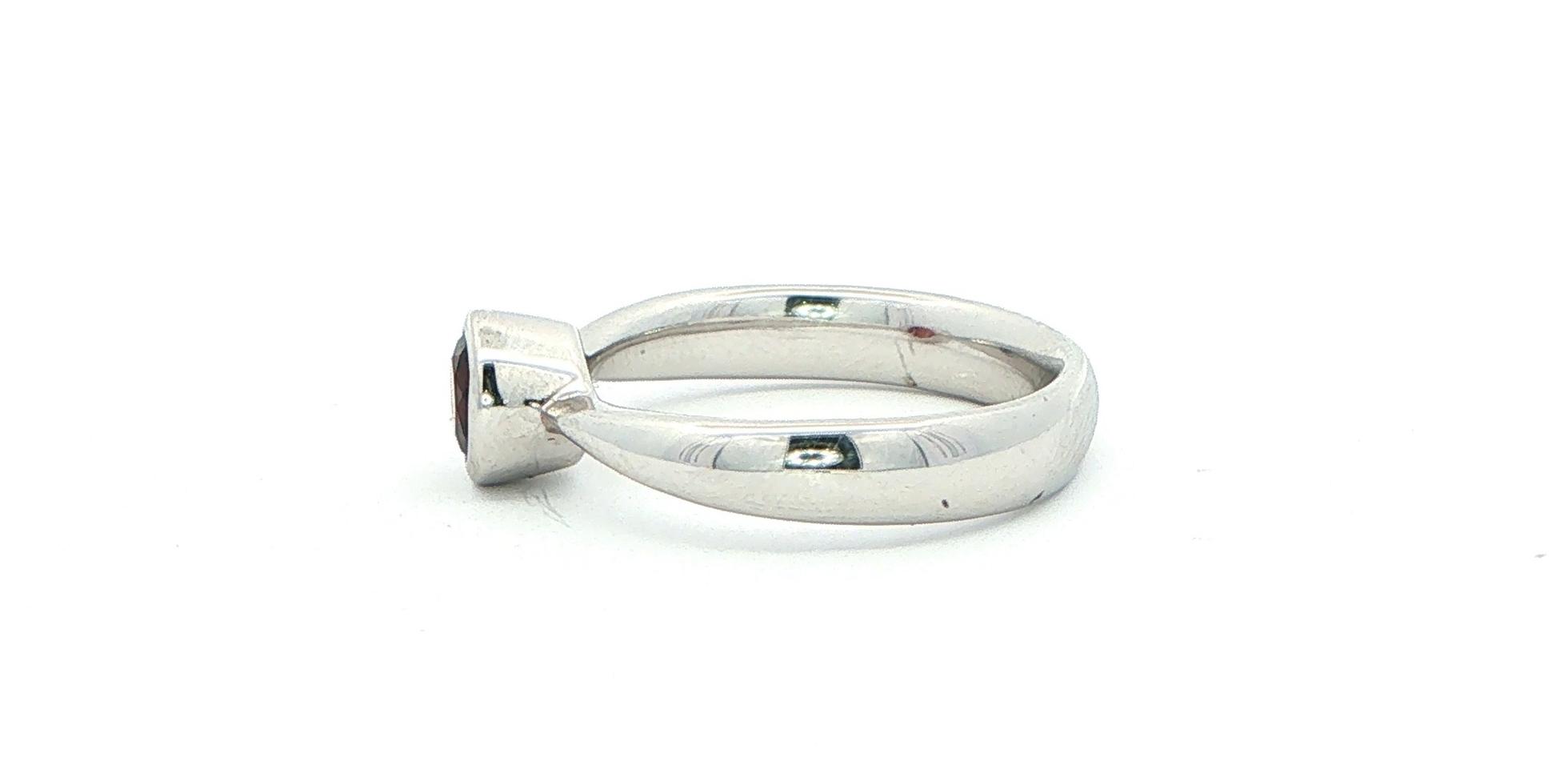 Bezel-Set Garnet Solitaire Ring in Sterling Silver (0.45cts) side