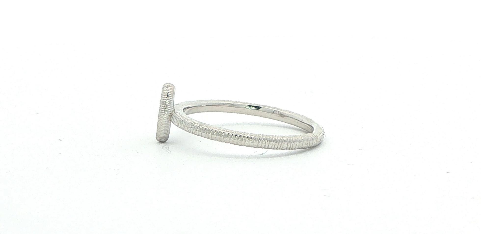 Estate Piece: Round Diamond Marquise-Shaped Stackable Ring with Textured Band in White Gold (0.05cts TWT) side