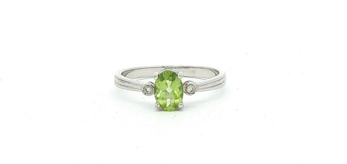content/products/Oval Peridot and Diamond Three-Stone Ring in White Gold