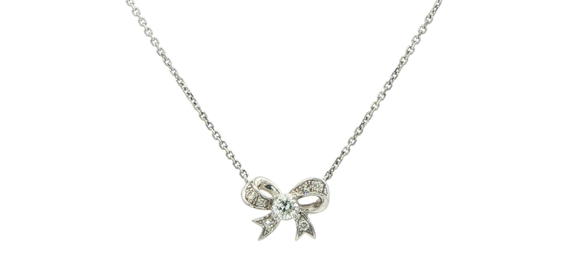Diamond Bow Pendant Necklace in White Gold (0.13cts TWT)