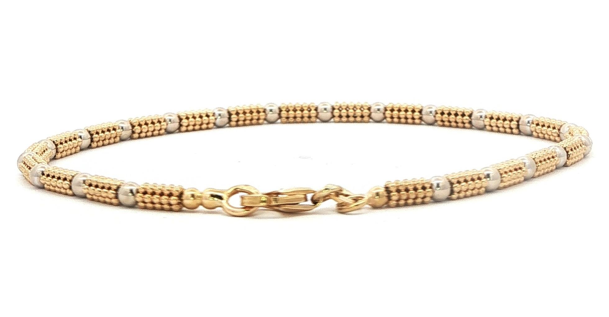 Estate Piece: Textured and Smooth Beaded Bracelet in Two-tone Yellow and White Gold back