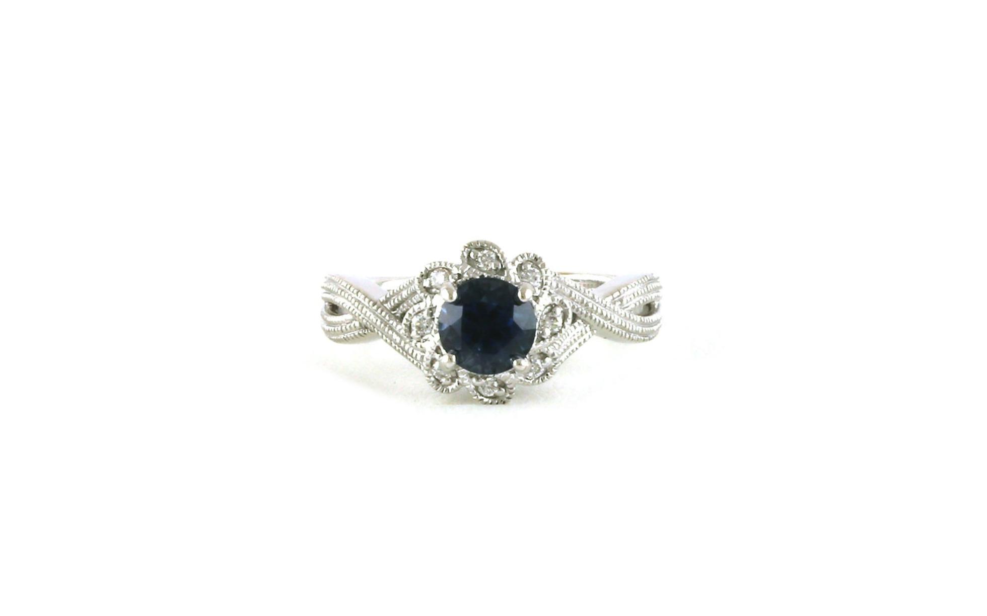 Estate Piece: Montana Sapphire with Diamond Flower Halo and Split Shank in White Gold (1.19cts TWT)
