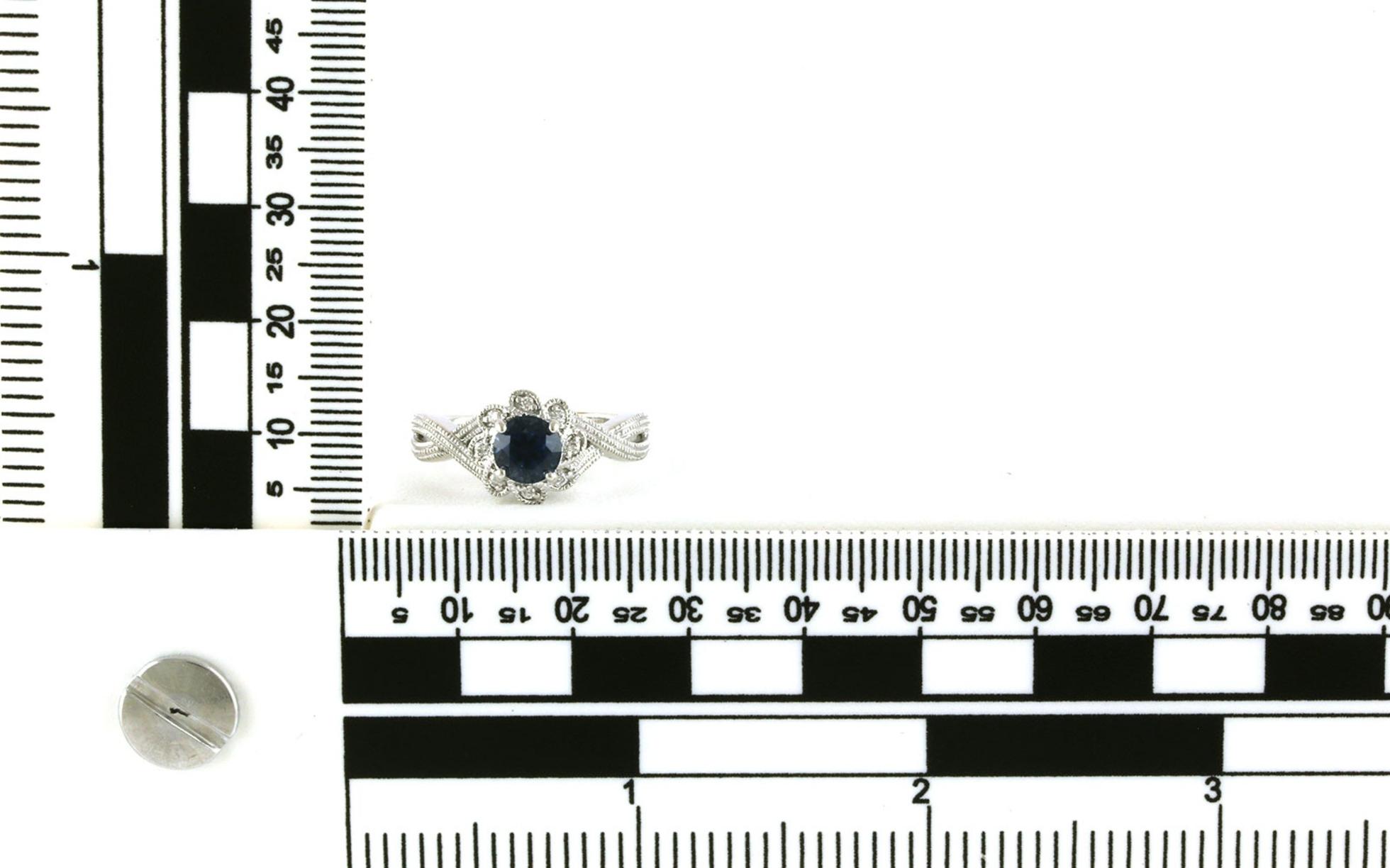 Estate Piece: Montana Sapphire with Diamond Flower Halo and Split Shank in White Gold (1.19cts TWT) scale