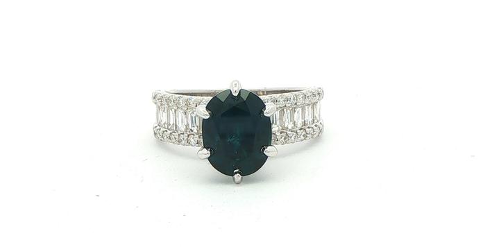 content/products/Deep Blue Oval Montana Sapphire Ring with 3 Row Round and Baguette Diamond Shank in White Gold (3.93cts TWT)
