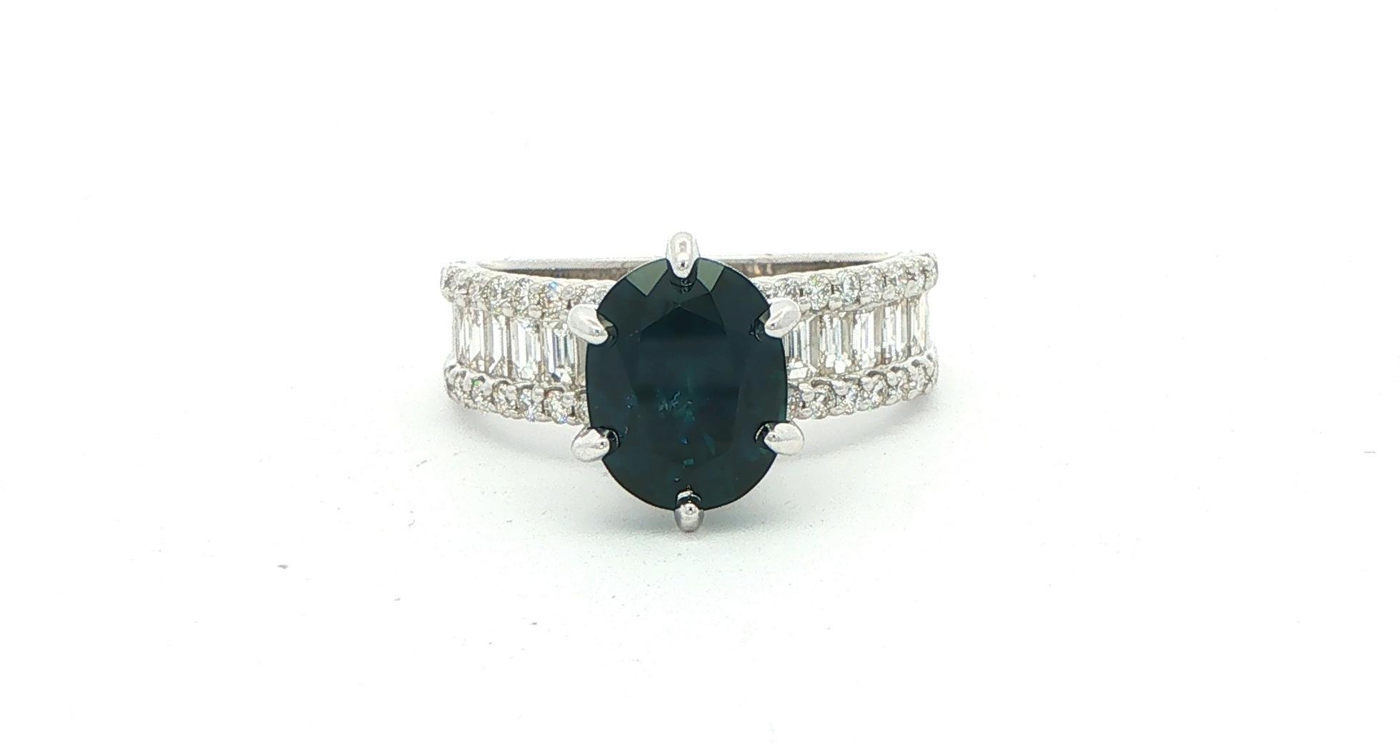 Deep Blue Oval Montana Sapphire Ring with 3 Row Round and Baguette Diamond Shank in White Gold (3.93cts TWT)