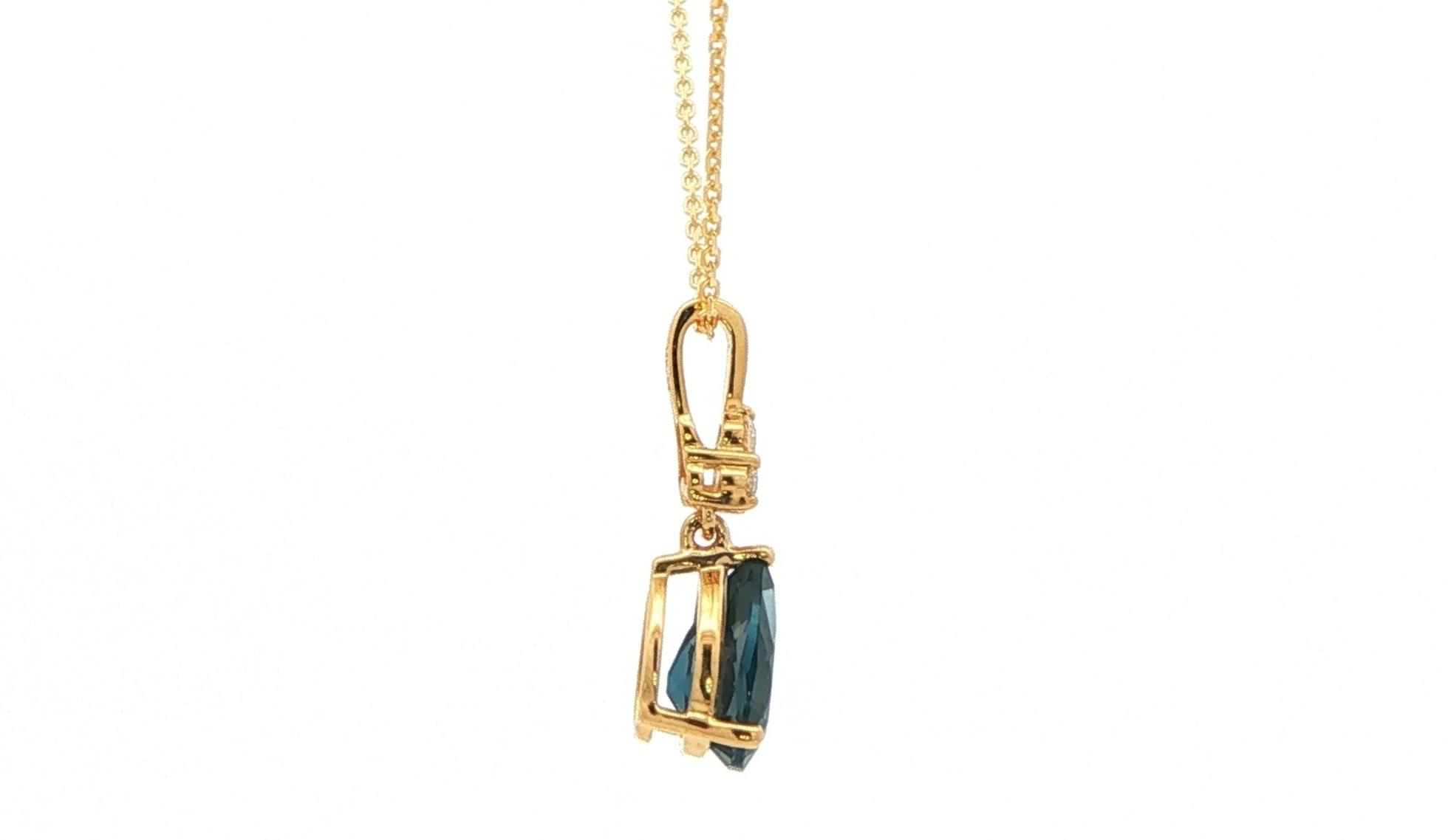 Pear-Cut London Blue Topaz Pendant Necklace with Diamond Cluster Accent in Yellow Gold (1.45cts TWT) side