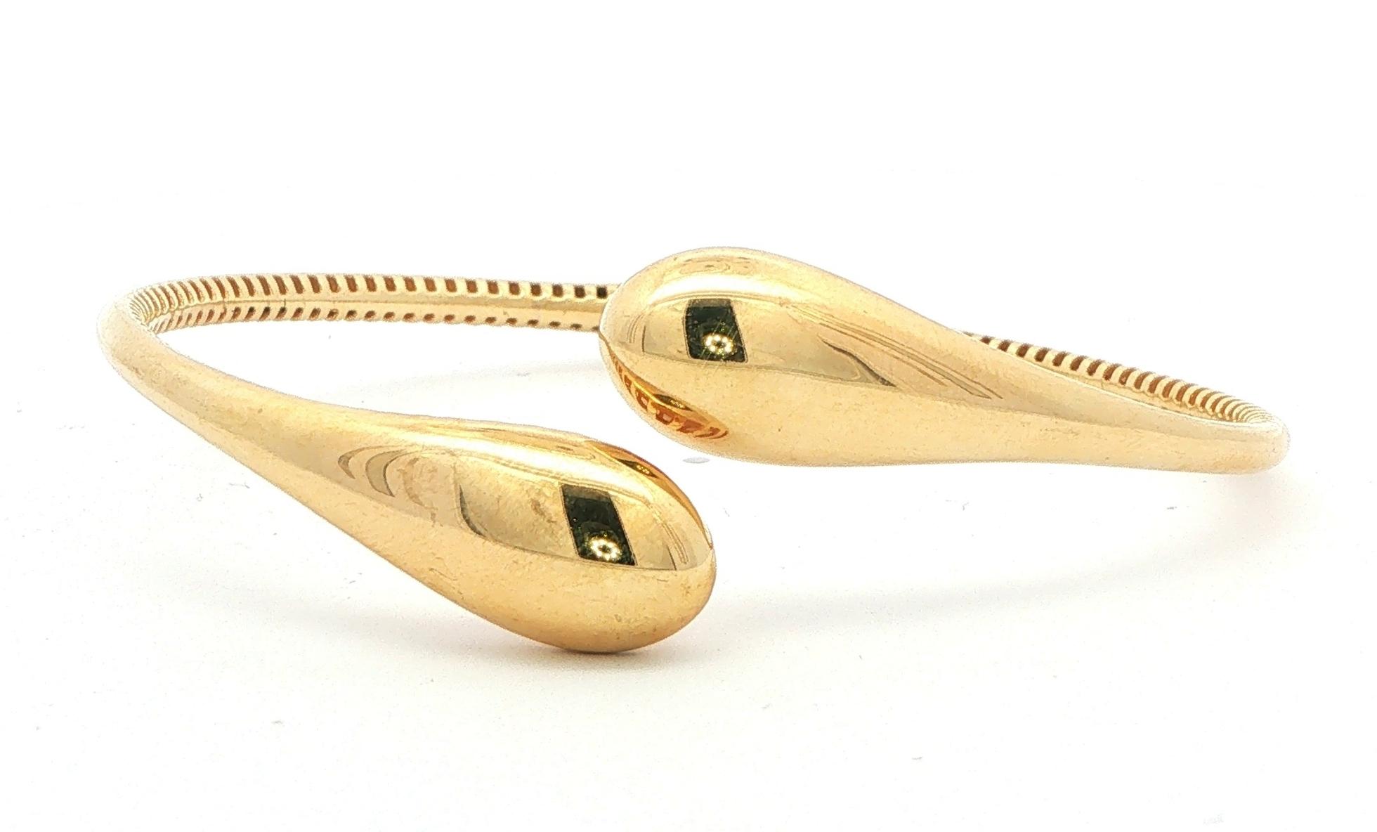 Open Bypass Teardrop Hinged Bangle Bracelet in Yellow Gold