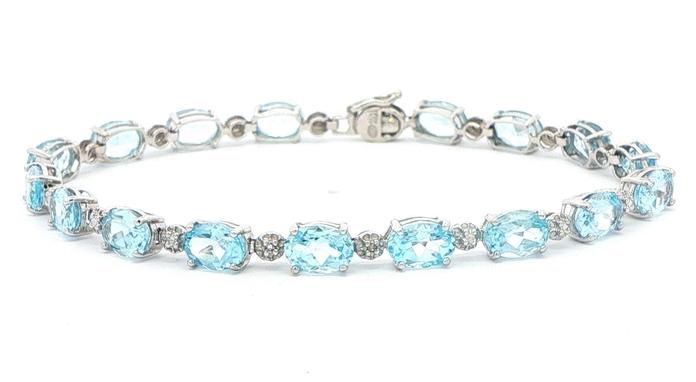 content/products/Estate Piece: Oval Sky Blue Topaz Tennis Bracelet in White Gold 