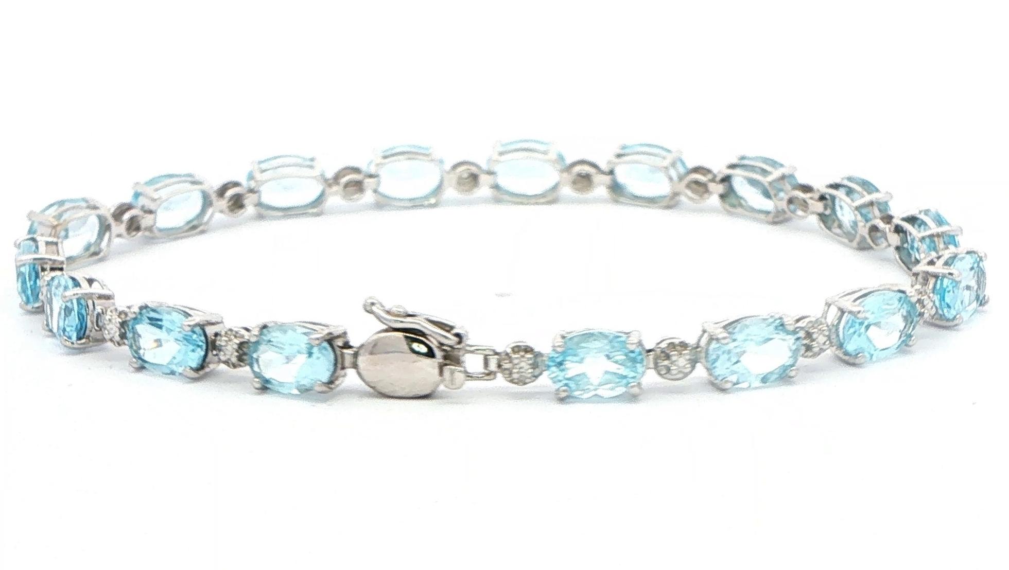 Estate Piece: Oval Sky Blue Topaz Tennis Bracelet in White Gold back