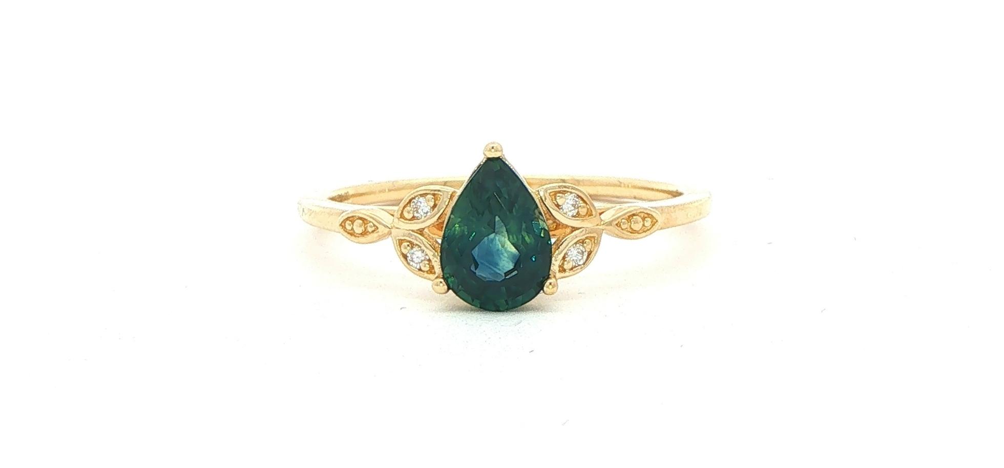 Nature-Inspired Pear-cut Montana Sapphire and Diamond Ring in Yellow Gold (0.97cts TWT)
