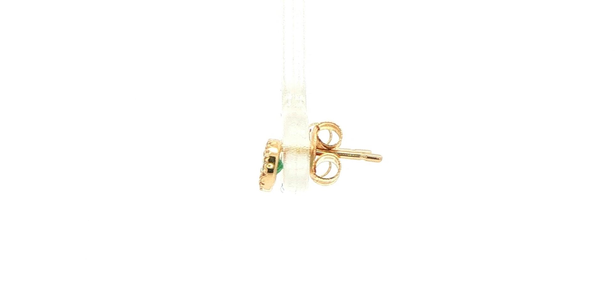 Oval Emerald and Diamond Halo Stud Earrings in Yellow Gold (0.40cts TWT) side