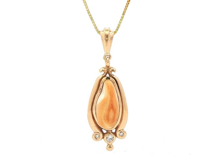 content/products/Estate Piece: Elk Ivory Pendant Necklace with Diamond Accents in Yellow Gold
